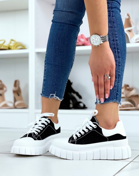 Black sneakers with white thick sole