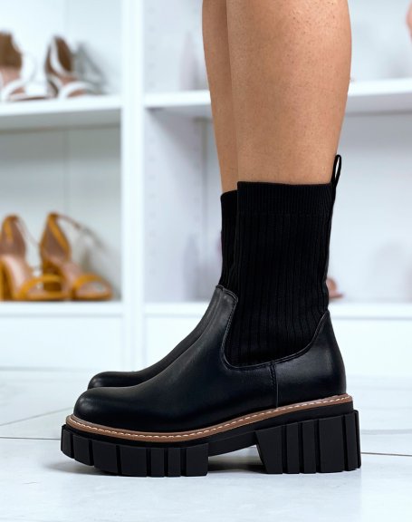 Black sock boots with chunky sole and brown piping
