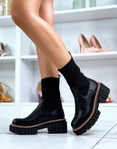 Black sock boots with chunky sole and brown piping
