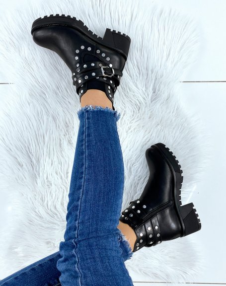 Black studded ankle boots with notched soles