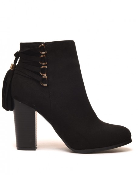 Black suede ankle boots with heels and laces at the back