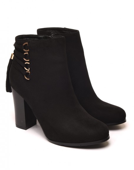 Black suede ankle boots with heels and laces at the back