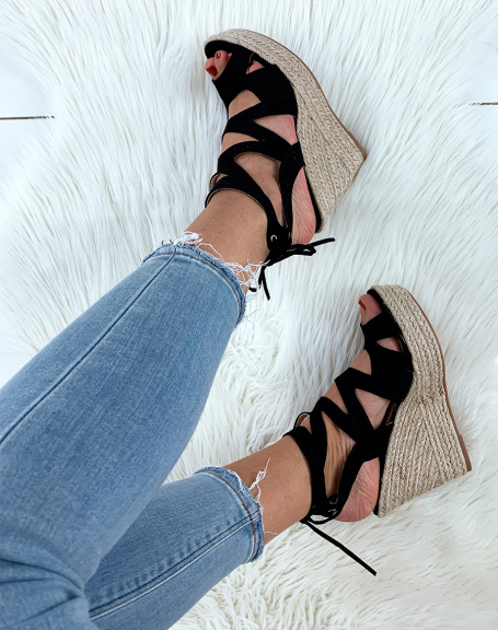 Black suede wedges with multiple straps and laces