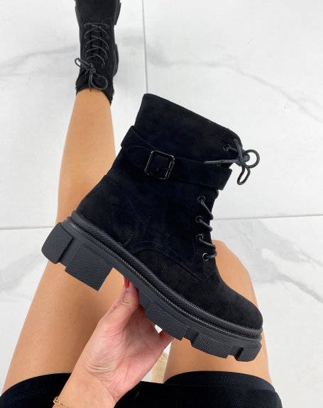 Black suedette ankle boots with a strap and notched sole