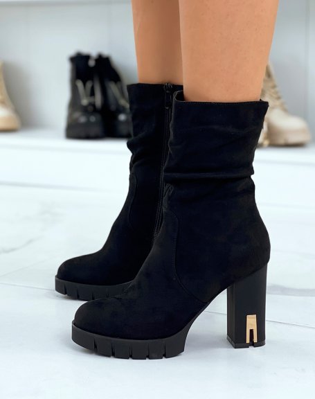 Black suedette ankle boots with gold detail heel