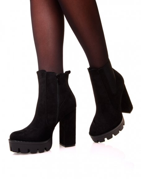 Black suedette ankle boots with heels and notched platforms