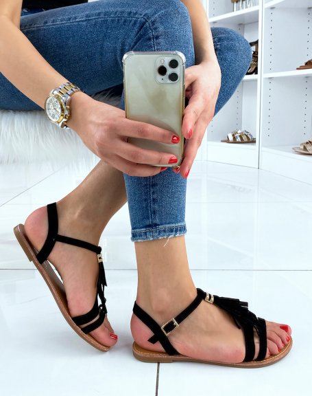 Black suedette sandals with fringes and gold detail