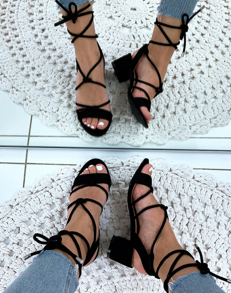 Black suedette sandals with low heels and ankle laces