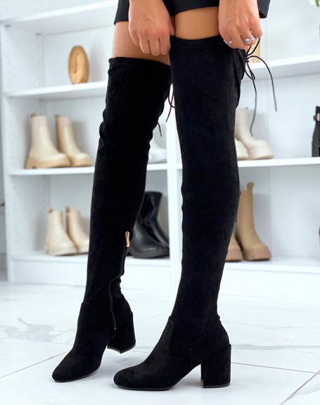 Black suedette thigh-high boots with a mid-high heel and round toe