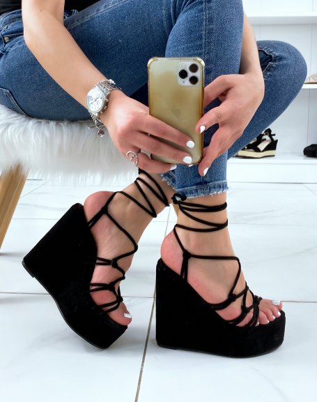 Black suedette wedges with thin knotted straps and lace