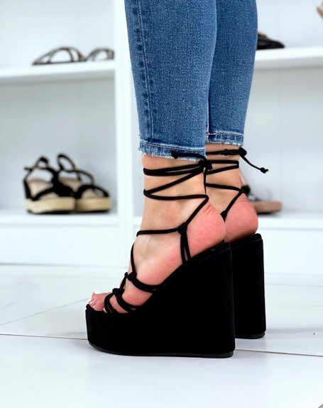 Black suedette wedges with thin knotted straps and lace
