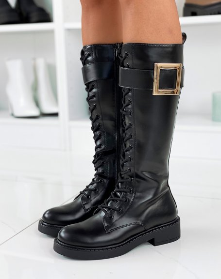 Black tall boots with big gold buckle