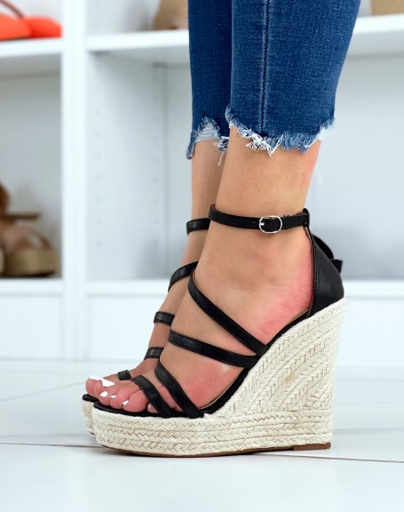 Black wedge with criss-cross straps and high heel