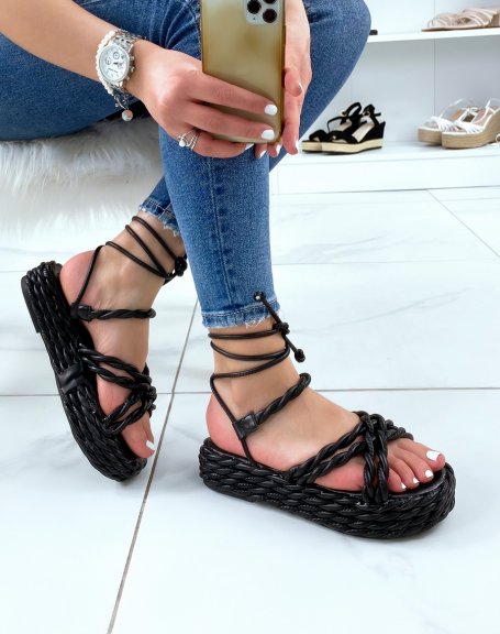 Black wedges with long straps and braided sole