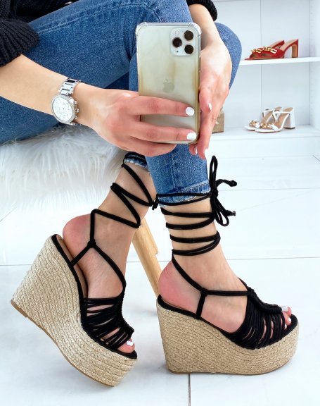 Black wedges with multiple straps and long straps