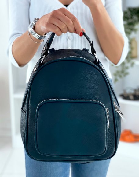 Blue backpack with silver zips