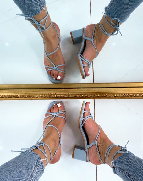 Blue sandals with low heel and multiple straps