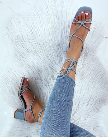 Blue sandals with low heel and multiple straps