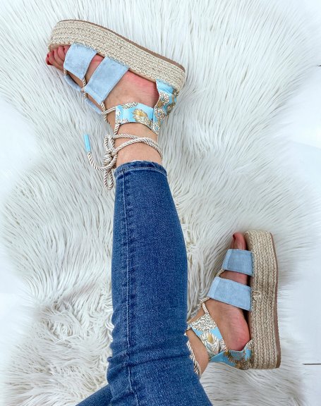 Blue wedges with asymmetric patterns with lace and hessian sole