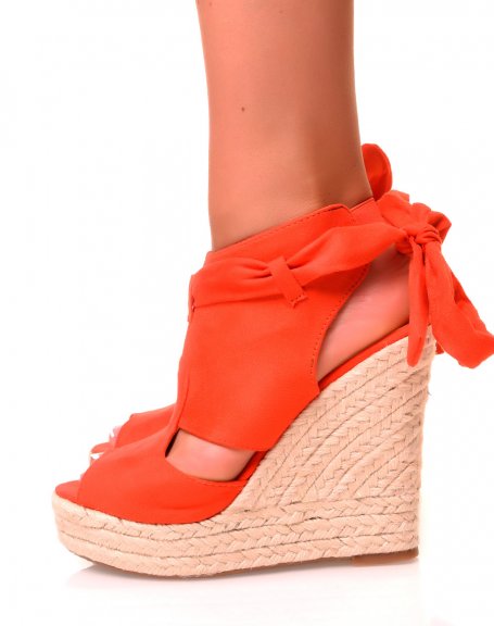 Bright orange suede wedge sandals
