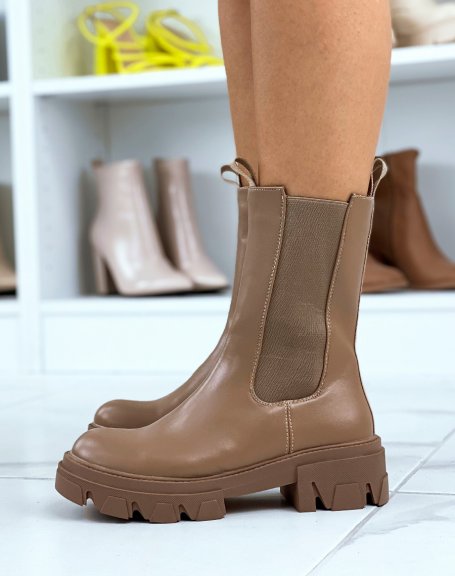 Brown Chelsea boots with heeled and lugged sole