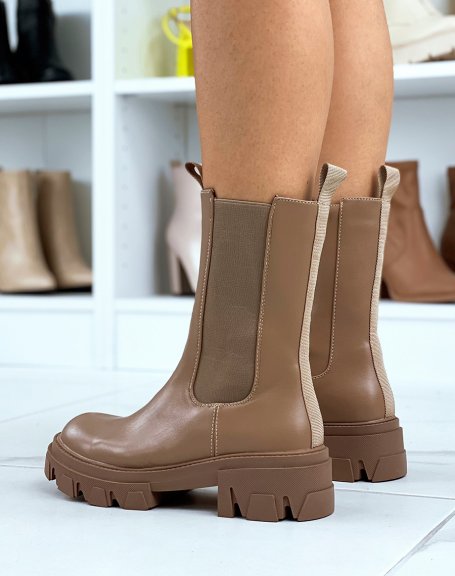Brown Chelsea boots with heeled and lugged sole