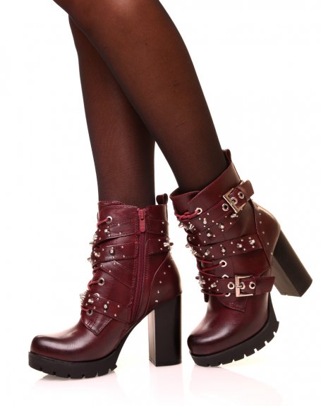 Burgundy ankle boots with studded straps at heels