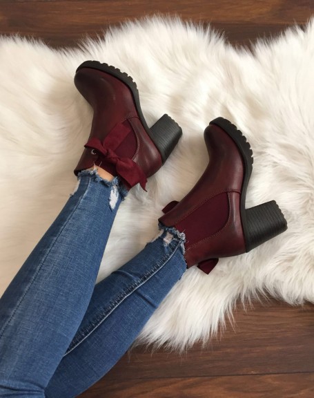 Burgundy notched ankle boots with knots and eyelets