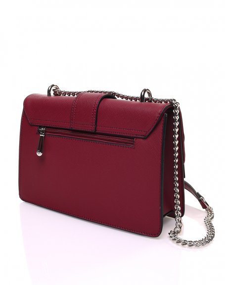 Burgundy textured handbag with double flaps and silver buckle