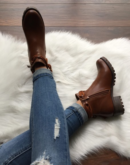 Camel Chelsea boots with straps and pompoms