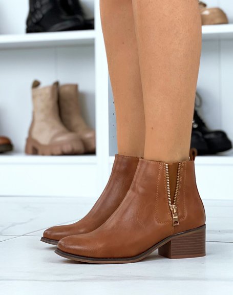 Camel low ankle boots with golden closure