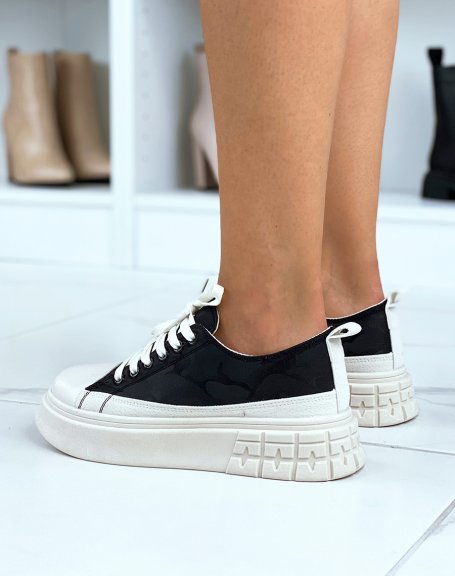 Canvas sneakers with black patterns and beige sole
