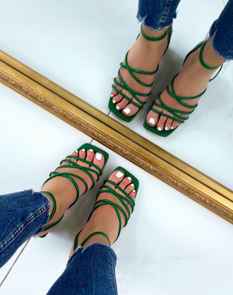 Emerald green sandals with heel and multiple straps