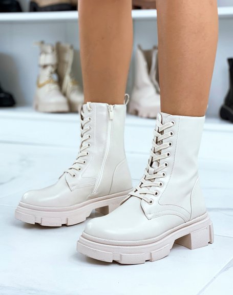 Extra high beige ankle boots with laces and notched sole