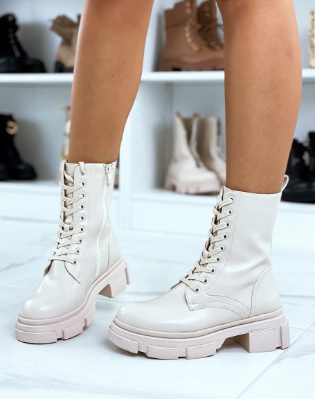 Extra high beige ankle boots with laces and notched sole