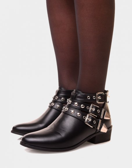 Flat black ankle boots with different studded straps