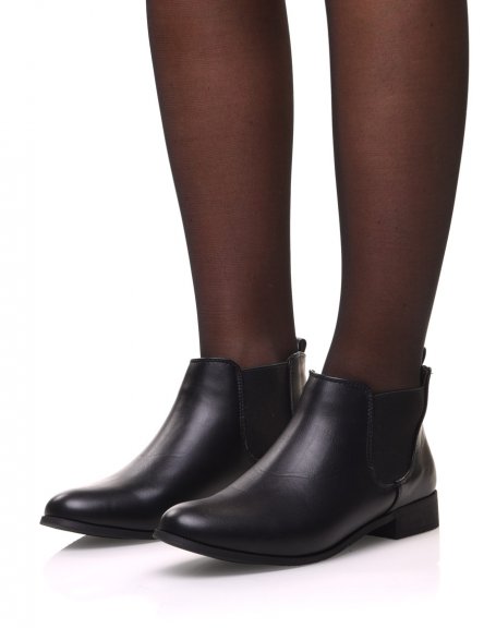 Flat black Chelsea boots