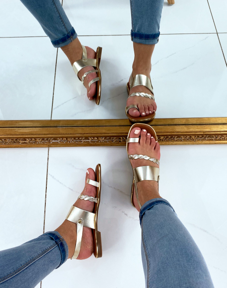 Flat leather sandals with golden braided strap