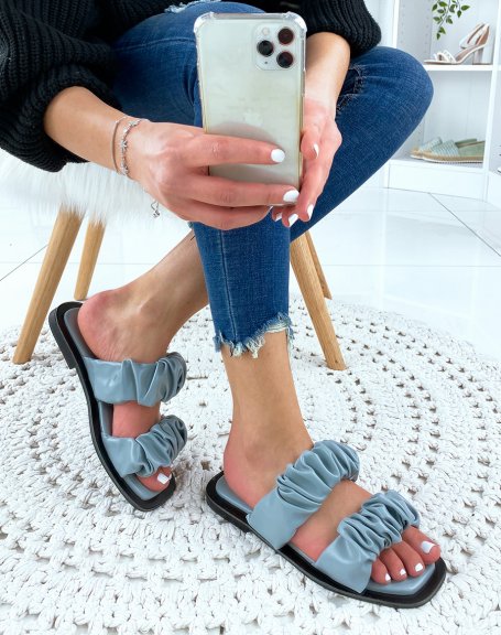 Flat sandals in blue faux leather