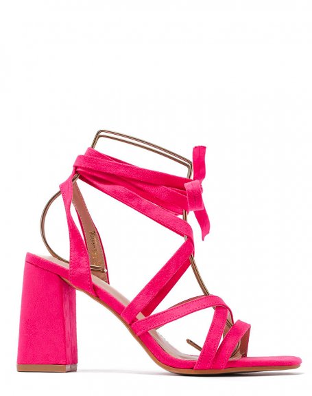 Fushia sandals with narrow straps crossed with lace and heel
