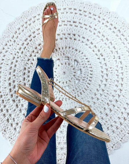 Gold flat sandals with chains