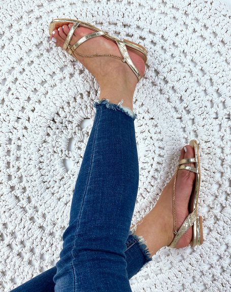 Gold flat sandals with chains