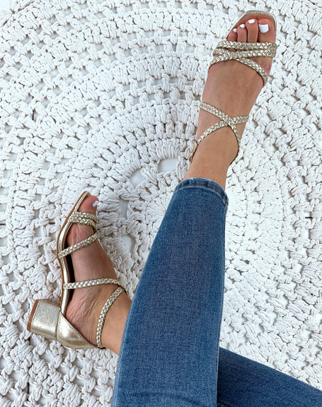 Gold heeled sandals with braided straps