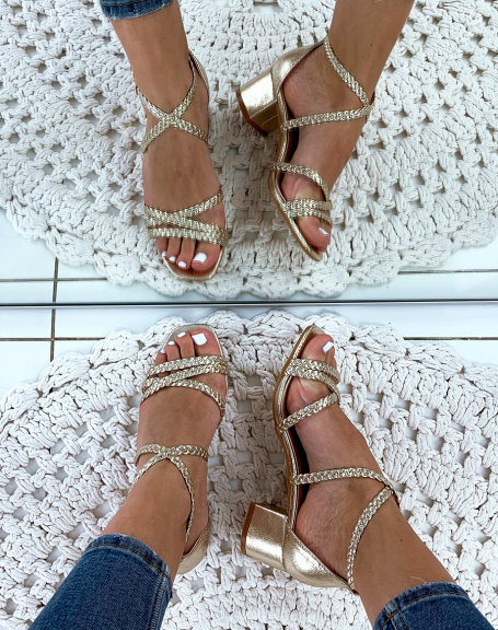 Gold heeled sandals with braided straps