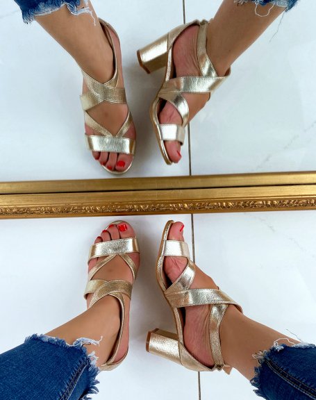 Gold heeled sandals with multiple straps