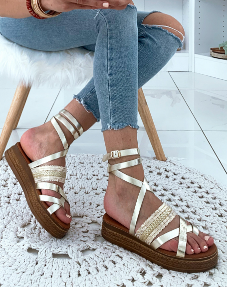 Gold leather lace-up wedge-soled sandals
