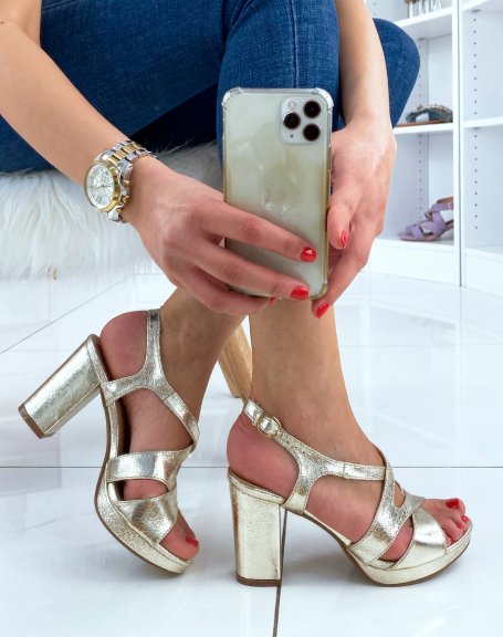 Gold sandals with chunky heel and small platform