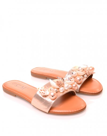 Gold sandals with pearl and shell details