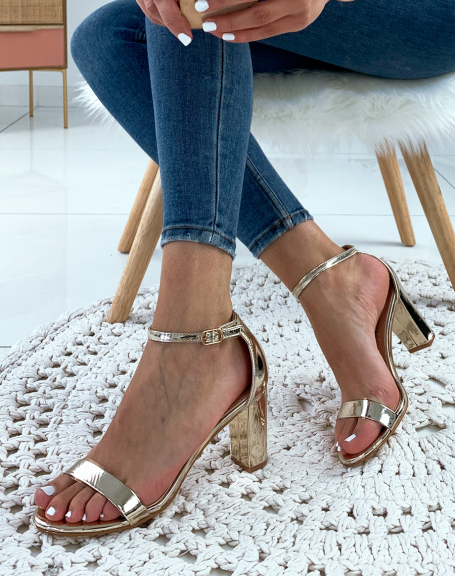 Golden patent sandals with square heels