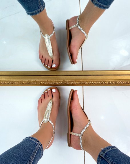 Golden sandals with braided detail